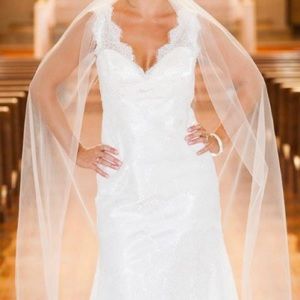 Wedding dress and floor length veil